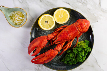 Close up of fresh steamed lobster with herbs
