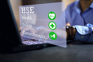 health safety environment concept with a man working on desktop to manage the work place to complied and meet safety regulation requirement and life quality of staff in employment