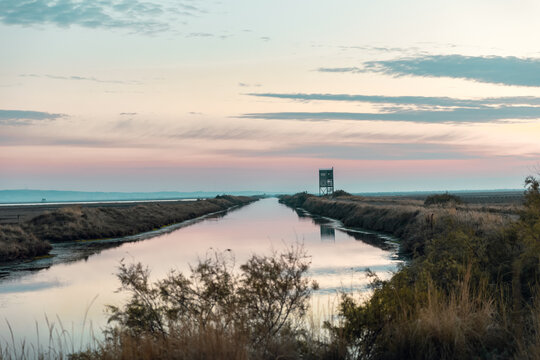 Beautiful sunset or sunrise on the wetland National Park Delta Evros in Thrace Greece near to Feres and Alexandroupolis, near Greek Turkish borders, panoramic view