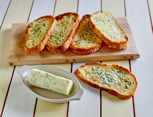 Texas toast topped with an herb butter compound