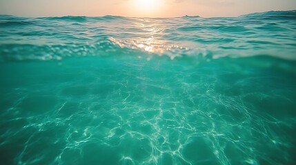 Ocean Surface and Underwater View at Sunset