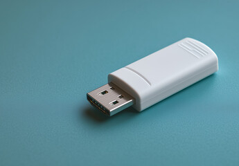 White USB Drive on Light Blue Surface Technology Data Storage Device
