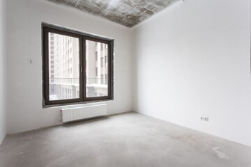 interior of the apartment without decoration in gray colors. rough finish