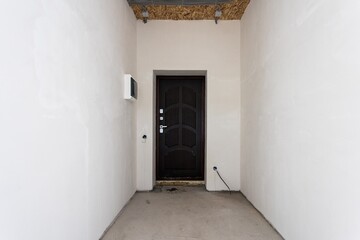 interior of the apartment without decoration in gray colors. rough finish