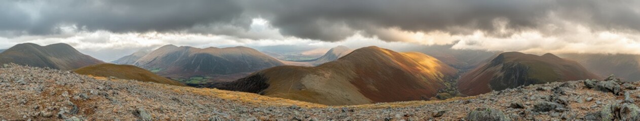 Stunning panorama of mountains under dramatic clouds