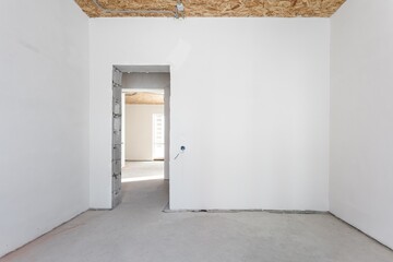 interior of the apartment without decoration in gray colors. rough finish