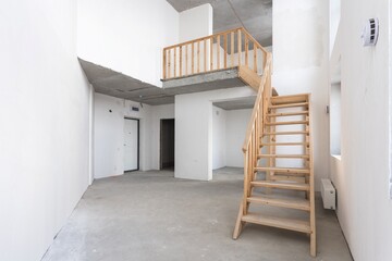 interior of the apartment without decoration in gray colors. rough finish