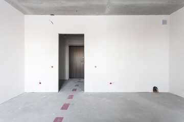 interior of the apartment without decoration in gray colors. rough finish
