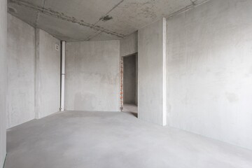 interior of the apartment without decoration in gray colors. rough finish