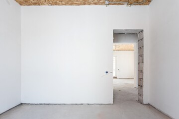 interior of the apartment without decoration in gray colors. rough finish