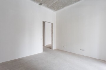 interior of the apartment without decoration in gray colors. rough finish