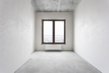 interior of the apartment without decoration in gray colors. rough finish