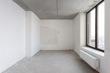 interior of the apartment without decoration in gray colors. rough finish