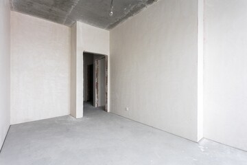 interior of the apartment without decoration in gray colors. rough finish