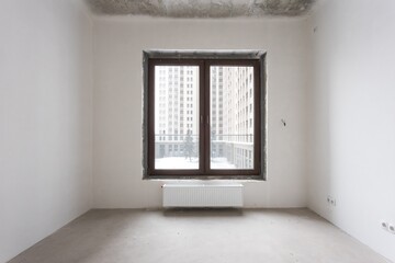 interior of the apartment without decoration in gray colors. rough finish