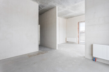 interior of the apartment without decoration in gray colors. rough finish