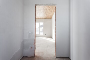 interior of the apartment without decoration in gray colors. rough finish