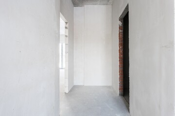 interior of the apartment without decoration in gray colors. rough finish