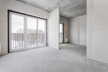 interior of the apartment without decoration in gray colors. rough finish