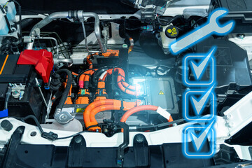 Electric car with open hood. Close up of inverter and wires