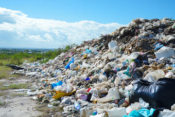 Dumping industrial waste in open areas without proper containment, leading to long-term environmental pollution. 