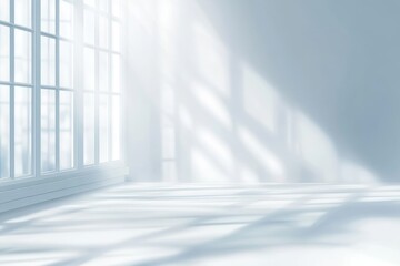 Obraz premium Bright sunlight shining through window in empty room