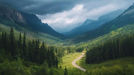 Fototapeta premium Majestic landscape of winding mountain road through lush forest valley