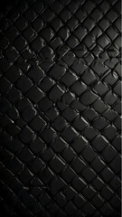 Fototapeta premium Dark, quilted texture resembling a mysterious, ancient, obsidian armor, with a deep, glossy black finish and diagonal pattern.
