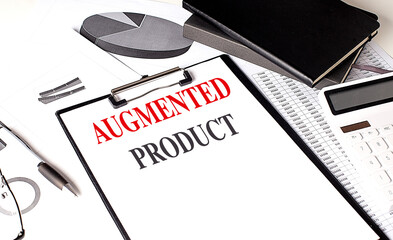 Clipboard with text augmented product on desk with charts, calculator, pen and notebooks