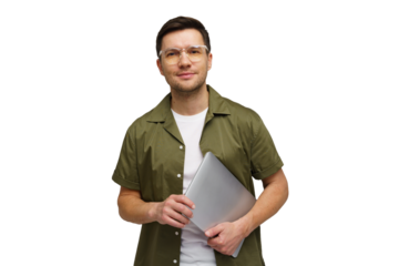 Man smiling while holding a laptop and wearing stylish glasses against a plain background