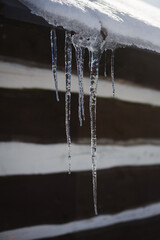 Icicles hanging from a roof