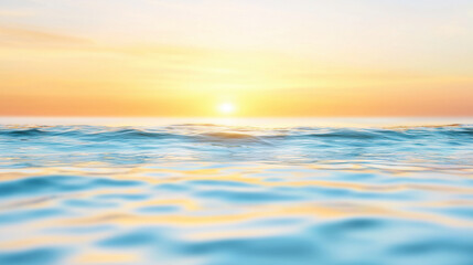 Obraz premium Gentle ocean waves reflect soft golden light during serene sunset, creating calming atmosphere perfect for relaxation