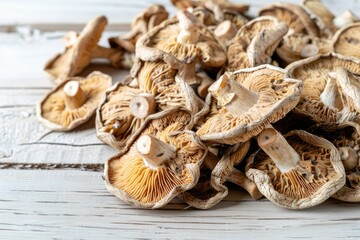 High Quality Picture of Dried Mushrooms on a Wooden Background
