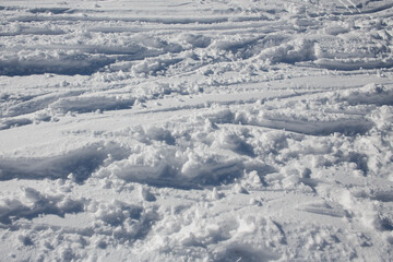 Traces of skis in the snow - background