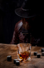 Glass of whiskey and stones