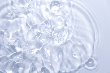 Clear Water Surface with Ripples and Reflections in Natural Light