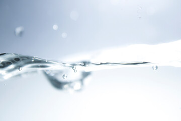 Crystal Clear Water Surface with Bubbles and Gentle Ripples