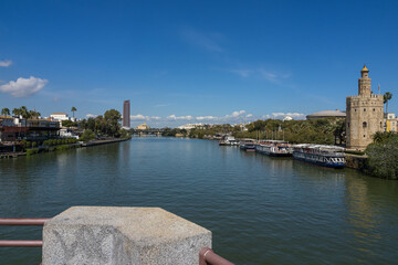 View of the Torre del Oro tower and the Guadalquivir river in Seville.