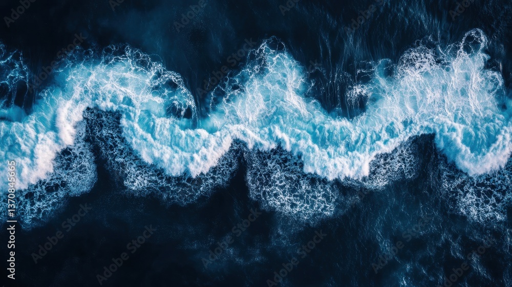 Poster aerial perspective of ocean waves crashing and foaming in deep blue water creating a dynamic and pow