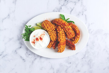 corn ribs, with cream sauce , spices and lime, appetizer, homemade, no people,