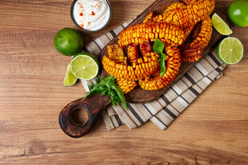 corn ribs, with cream sauce , spices and lime, appetizer, homemade, no people,
