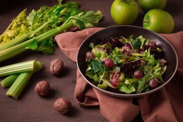 Fresh, Waldorf salad, celery stalk with chicken, apple and walnut, grapes, herbs, homemade, no...