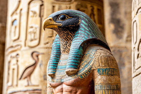 Statue of the Ancient Egyptian god Horus in stone temple