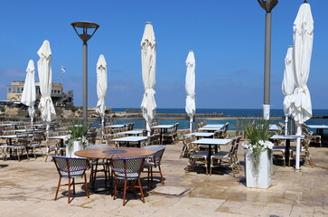 Chair and table in a cafe on the seashore