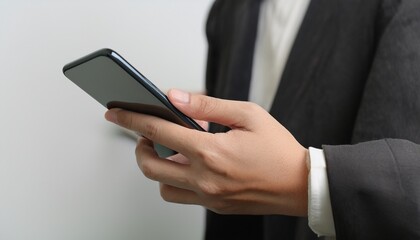 Businessman checking his smartphone