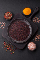 Red or brown raw rice in a ceramic bowl