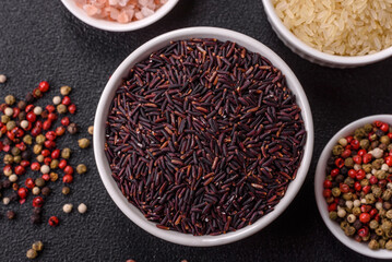 Red or brown raw rice in a ceramic bowl