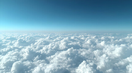 Fototapeta premium High Altitude View Of Fluffy White Clouds Against A Bright Blue Sky