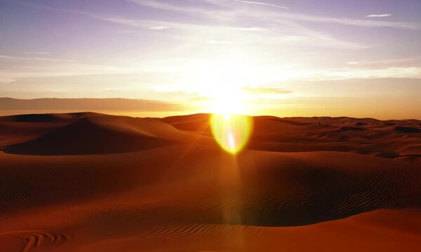 sunlight ray shooting across the desert sky at sunset