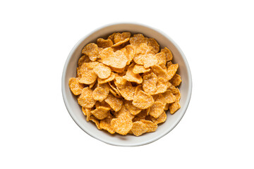 Fototapeta premium Close-up of a bowl of golden cornflakes ready for breakfast.